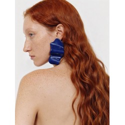 Pendientes asimétricos de...